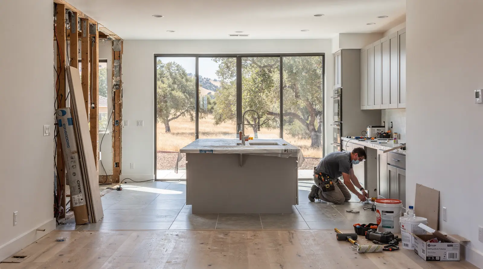 Services include kitchen remodels, bathroom remodels, roof replacement, hardscaping, and ADU development.; Custom home